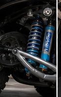 Coilover suspension components