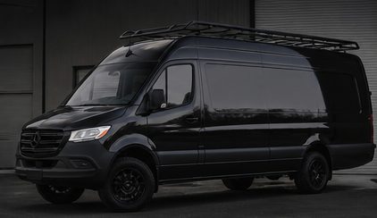 Blacked-out Sprinter van with roof rack